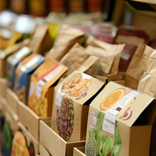 image shows various food items in boxes and bags